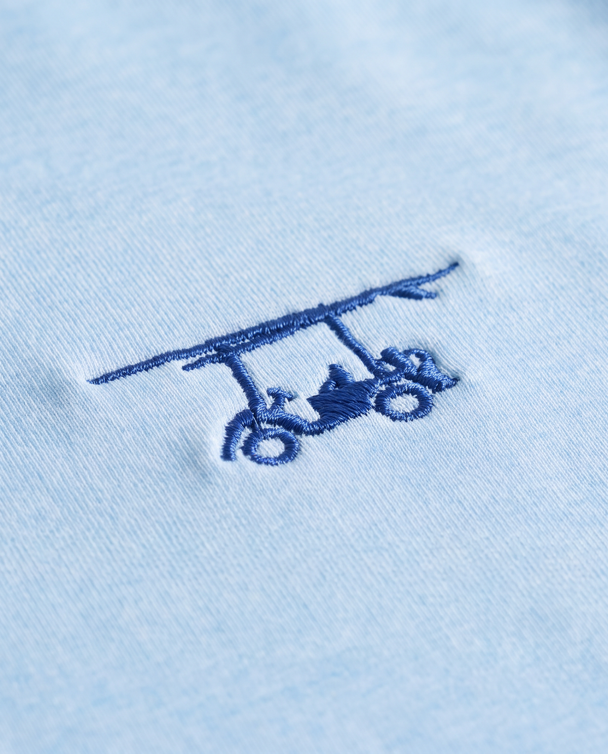 Albatross Polo Heather Bell logo detail