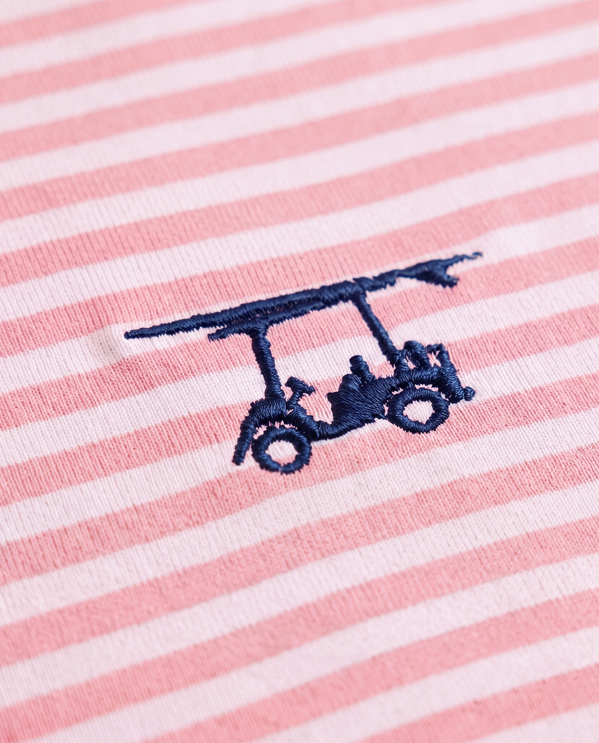 Albatross Polo Pink/Seaglass Feeder Stripe logo detail